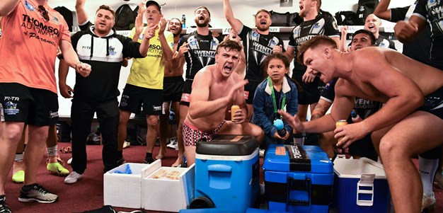 Magpies celebrate after progressing through to Grand Final