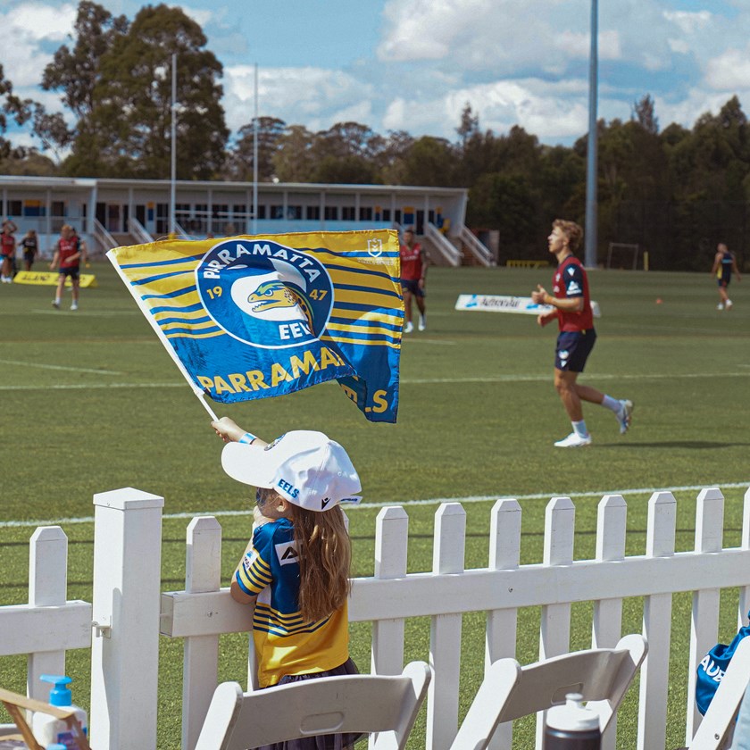 A young supporter watches the Eels train.